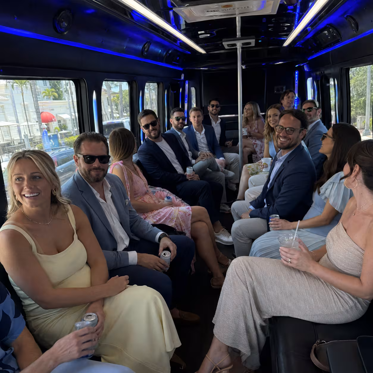 Wedding guests seated inside a Naples party bus