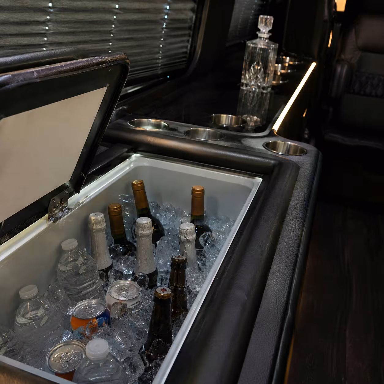 Onboard cooler and bar detail inside a Naples Sprinter limo party bus