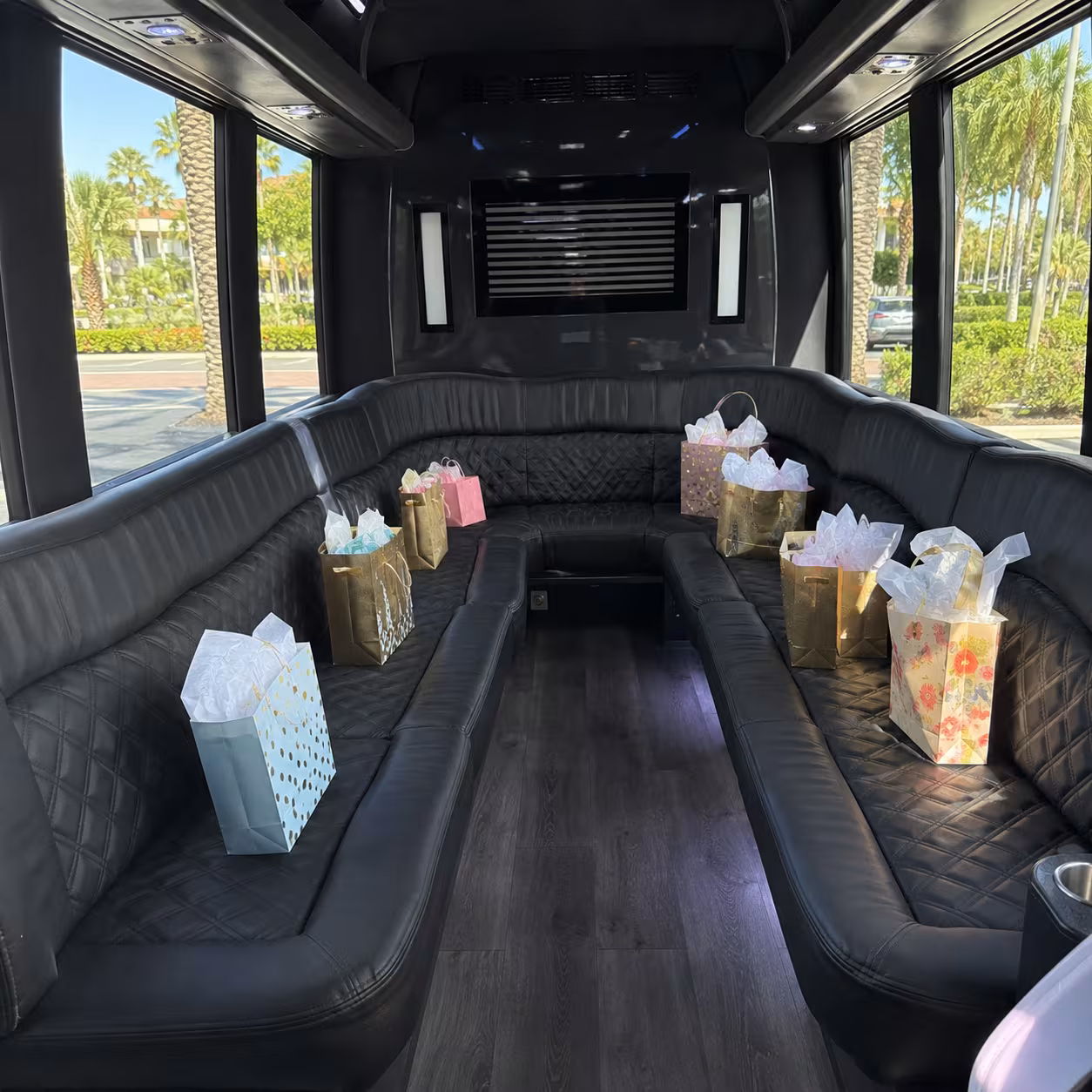 Grech GM24 minibus interior set up with birthday gift bags in Naples, Florida