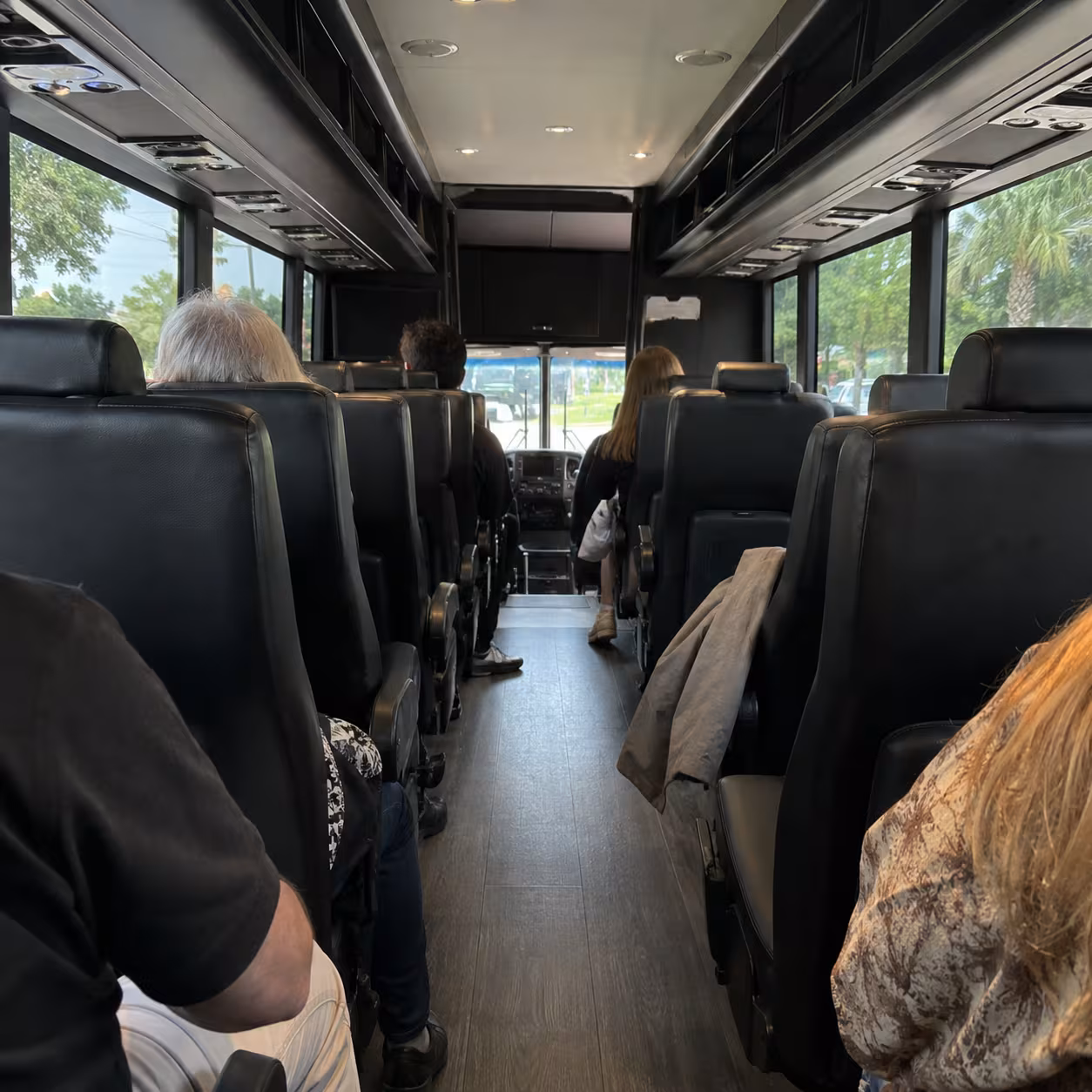Minibus aisle and seating for a concert group in Naples, Florida