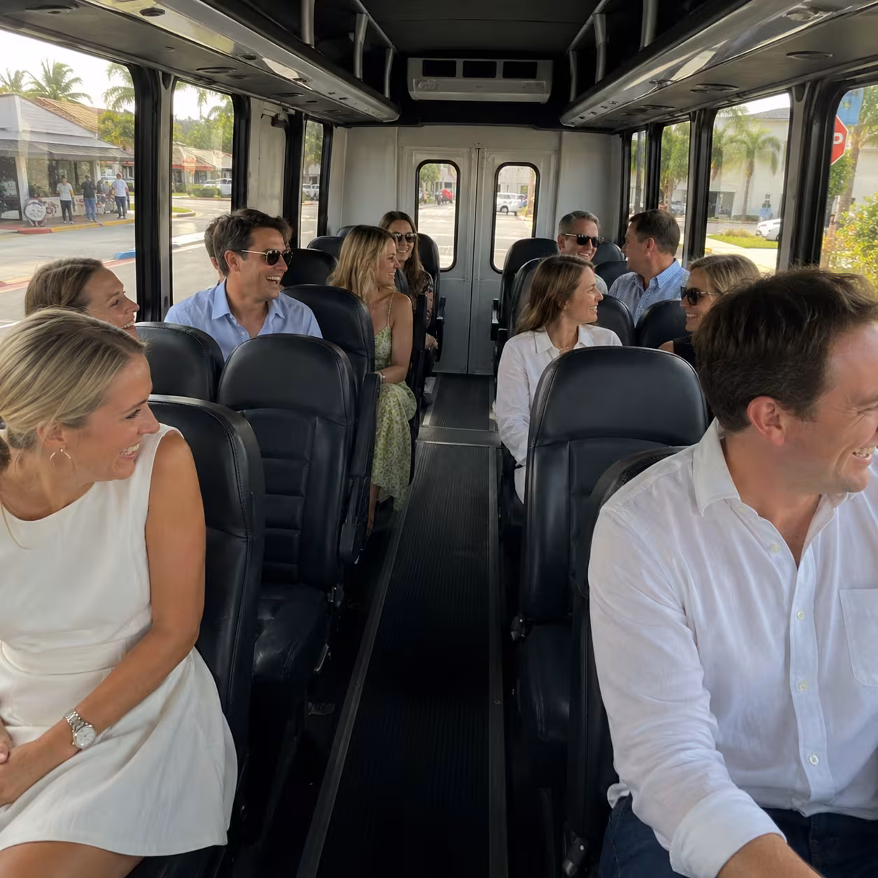Family seated in a minibus interior for a Naples private event