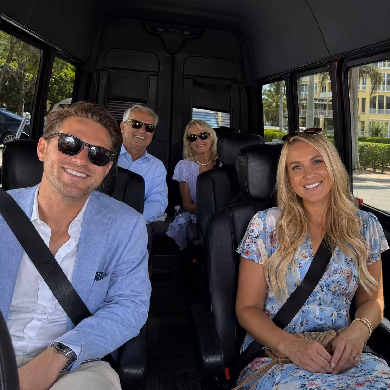 Passengers seated in a Sprinter van for a Naples private event