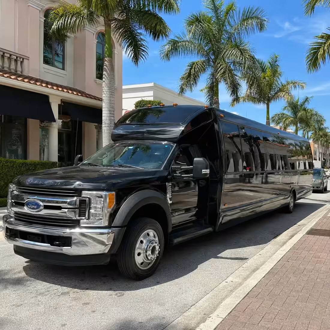 Black party bus exterior for Naples prom transportation