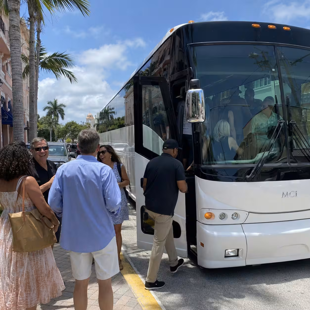 Passengers boarding a Naples prom party bus during Naples pickup coordination