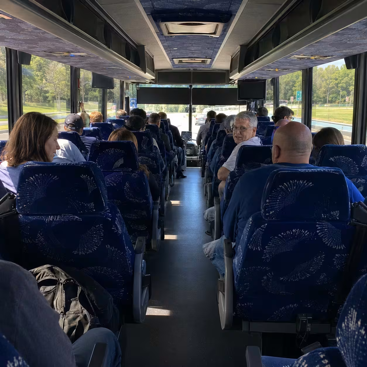 Comfortable onboard seating inside a Naples school event bus