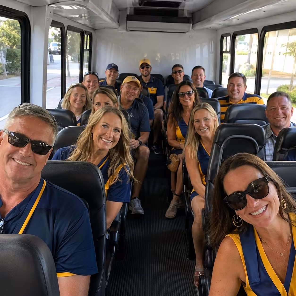Team seated in a minibus heading to a game in Naples, Florida