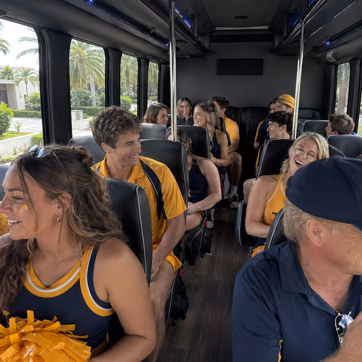 Sports team seated inside a minibus heading to a game in Naples, Florida
